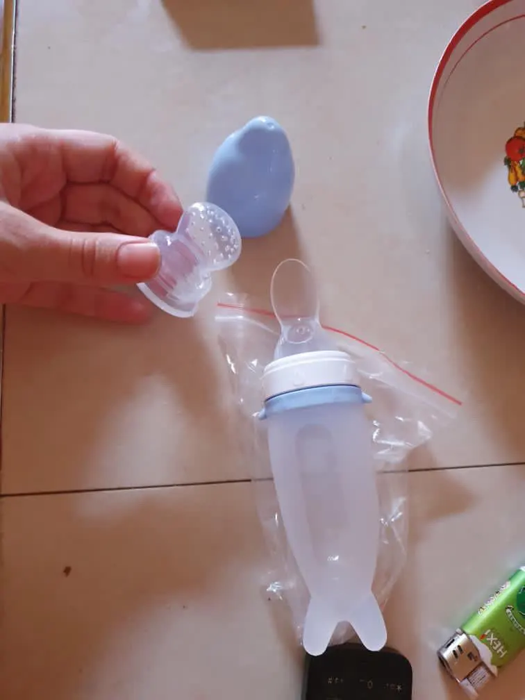 Silicone Dolphin Baby Feeding Bottle - Rice Cereal Spoon and Newborn Tableware photo review