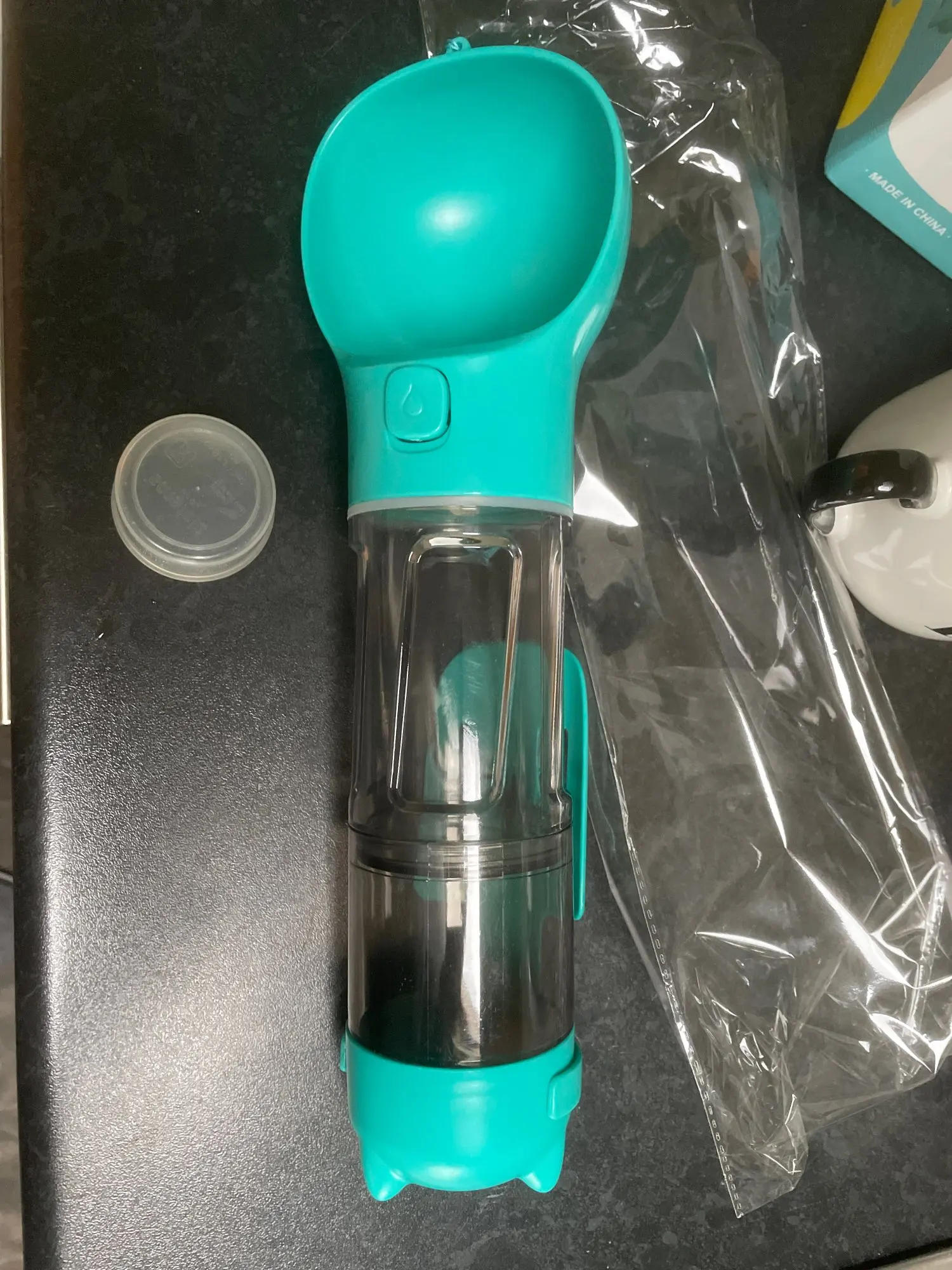 3-in-1 Portable Water Bottle, Food Feeder, and Waste Dispenser - Perfect for On-the-Go Adventures with Your Furry Friend photo review