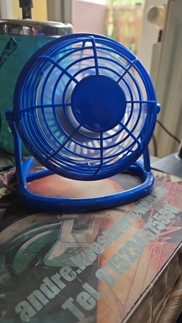 Silent USB Desk Fan 4 Blade Rotatable Mini Cooler photo review