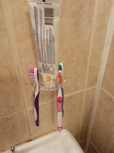 Toothbrush Hanger with Toothpaste Dispenser photo review