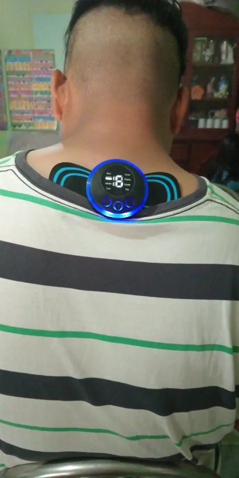 Tragbares EMS Nackenmassagegerät - Muskelstimulator für Nacken- und Rückenschmerzlinderung photo review