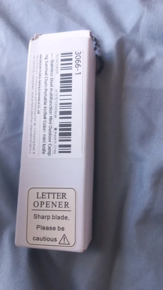 Mini faca portátil multifuncional de aço inoxidável para acampamento ao ar livre com corrente de sobrevivência photo review