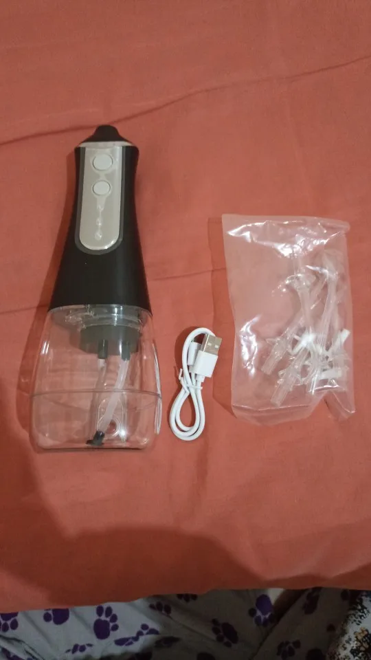 Portable Oral Irrigator | Dental Water Flosser USB Rechargeable photo review