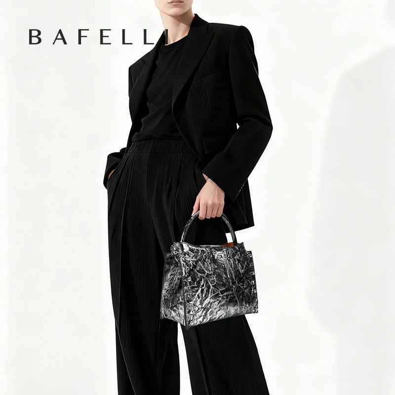 حقيبة يد جلد طبيعي بحزام