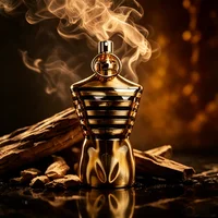 JPG Eau de Parfum 4.2 FL OZ 125ML, Flacon en verre brun à rayures dorées luxueuses, Arôme boisé doux et herbacé superposé, Cadeau de vacances idéal 1