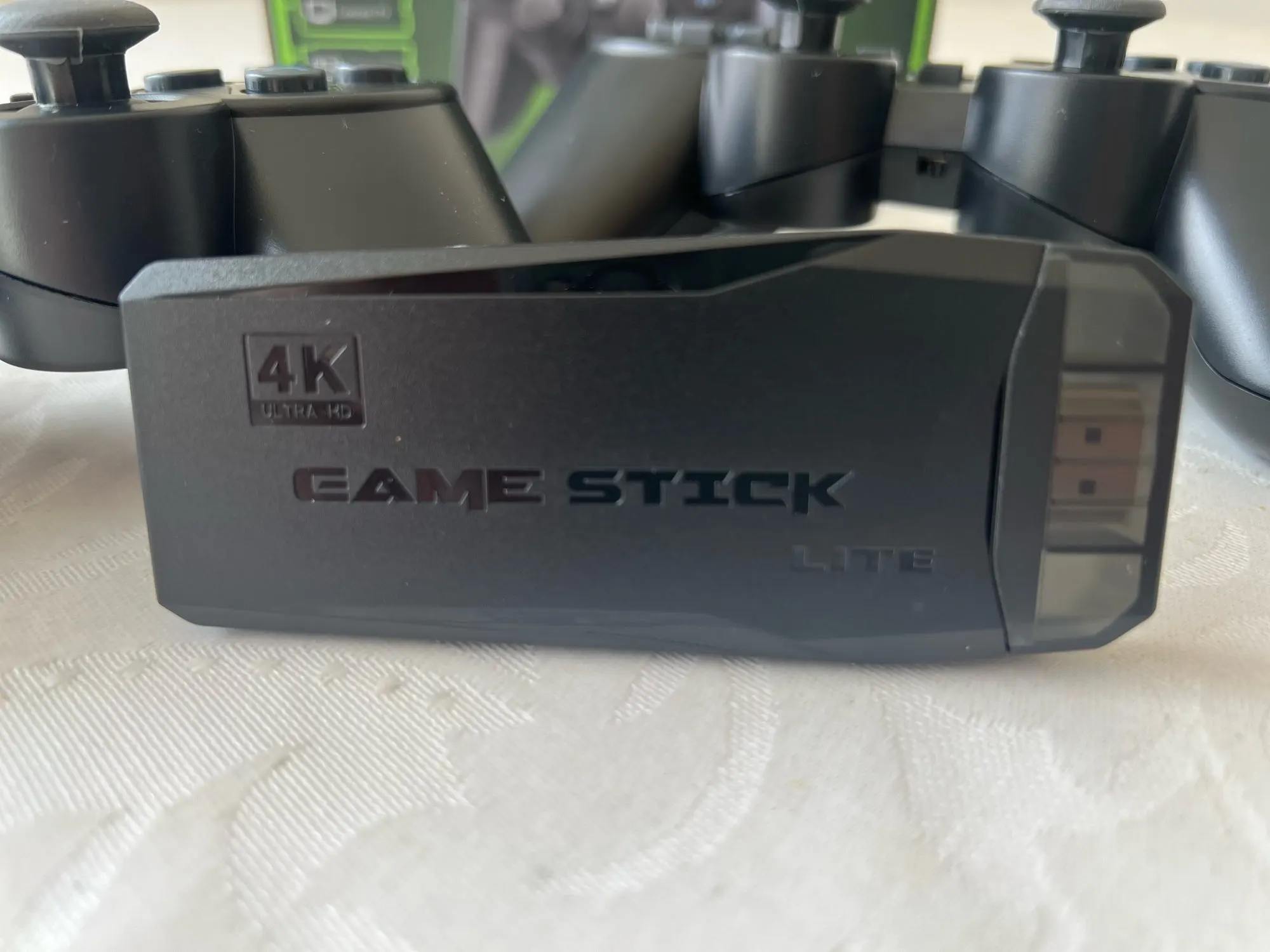 M8 videospelskonsol 2.4G dubbel trådlös handkontroll Game Stick 4K 10000 Spel 64GB Retrospel för PS1/GBA Boy Gift photo review