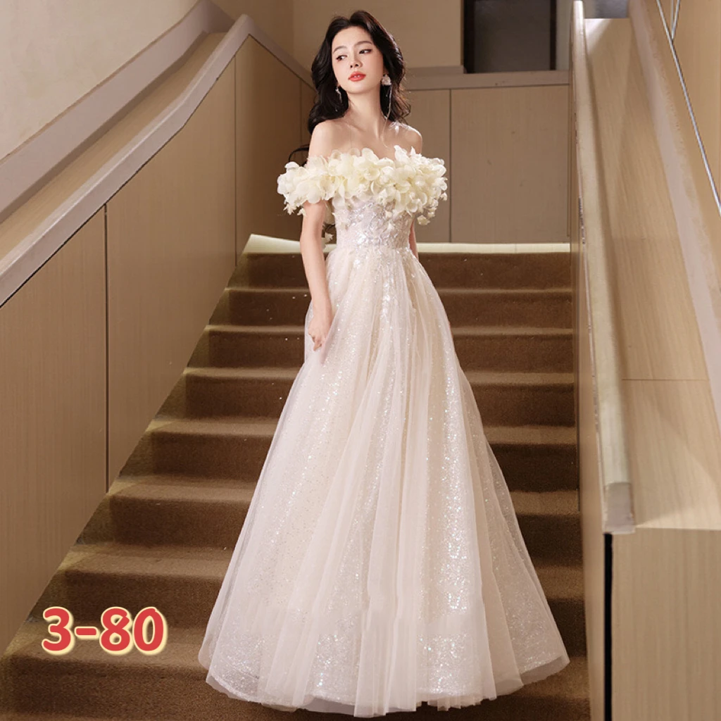 

Women's off-shoulder champagne evening dress