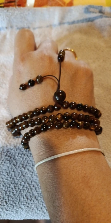 Collier mala tibétain en oeil de tigre - Source Sereine photo review