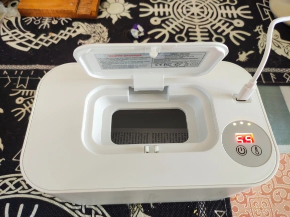 Aquecedor de toalhetes para bebés - foto de análise