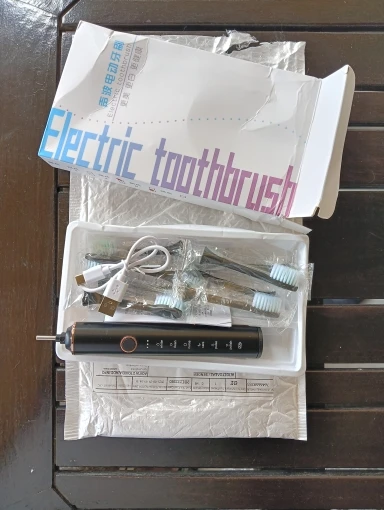 USB Fast Charging Sonic Electric Toothbrush with Smart Timer Rechargeable Adult Toothbrush Set Includes Replacement Heads photo review