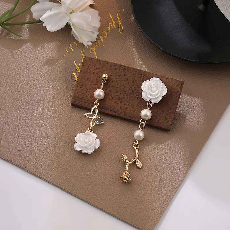 French retro elegant niche gentle asymmetric butterfly white rose earrings Sen series rose flower asymmetric earrings gift