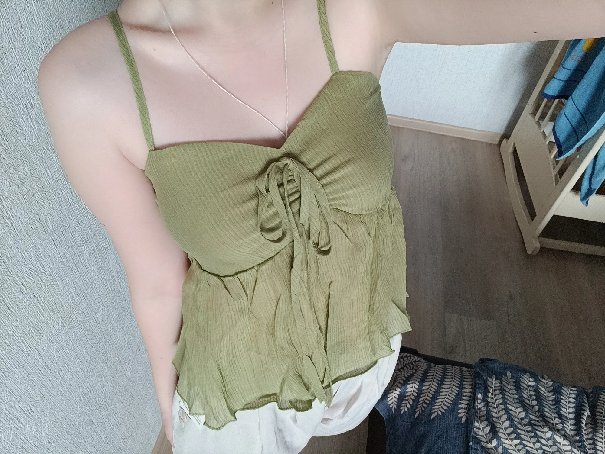 Elegant Linen Blend Babydoll Crop Top with Ruffle Details photo review