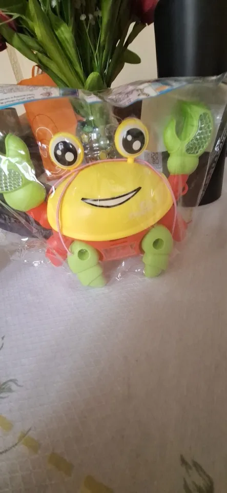 Brinquedo Caranguejo Fujão Musical Som Luz E Movimento photo review