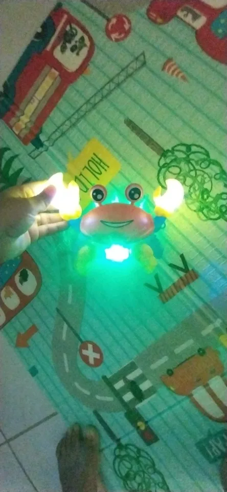 Brinquedo Caranguejo Fujão Musical Som Luz E Movimento photo review