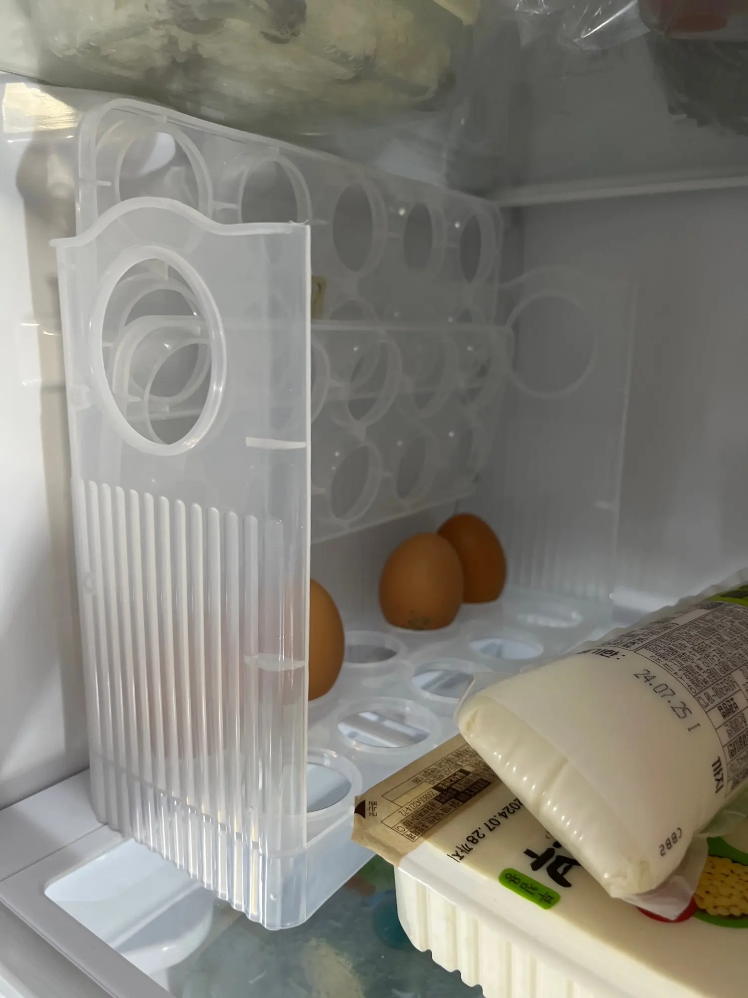 Space-Saver Egg Box with Auto-Flip Design - Freshness-Assured Refrigerator Door Egg Holder, Kitchen Organizer photo review