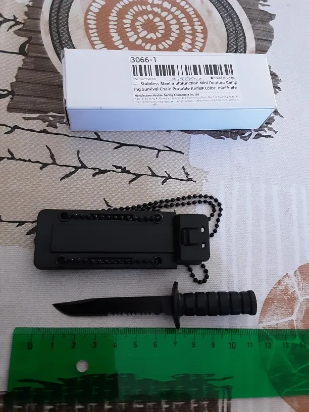 Mini faca portátil multifuncional de aço inoxidável para acampamento ao ar livre com corrente de sobrevivência photo review