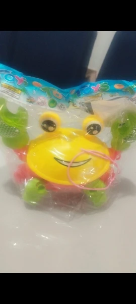 Brinquedo Caranguejo Fujão Musical Som Luz E Movimento photo review