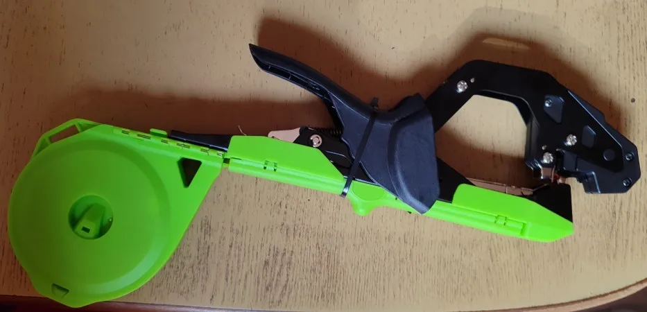 Onnfang Garden Hand Tying Machine Plant Lightweight Garden Tools Plant Tape tool for Vegetables Grapes Tomatoes Cucumbers Garden photo review