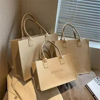 Vente en gros de 100 sacs fourre-tout en feutre personnalisés avec logo, sacs de shopping écologiques réutilisables de grande capacité 1