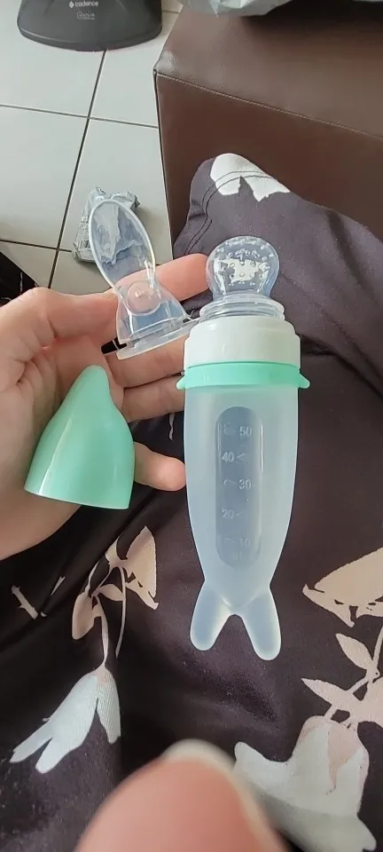 Silicone Dolphin Baby Feeding Bottle - Rice Cereal Spoon and Newborn Tableware photo review