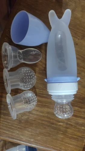 Silicone Dolphin Baby Feeding Bottle - Rice Cereal Spoon and Newborn Tableware photo review