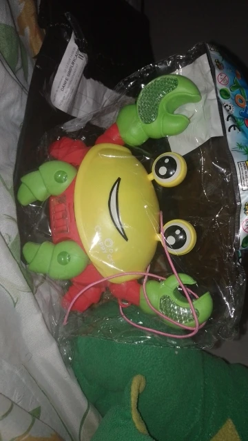 Brinquedo Caranguejo Fujão Musical Som Luz E Movimento photo review