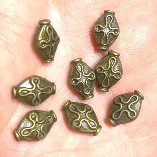 

20pcs 12*8*5mm antiqued bronze rhombus flower spacer bead h3832
