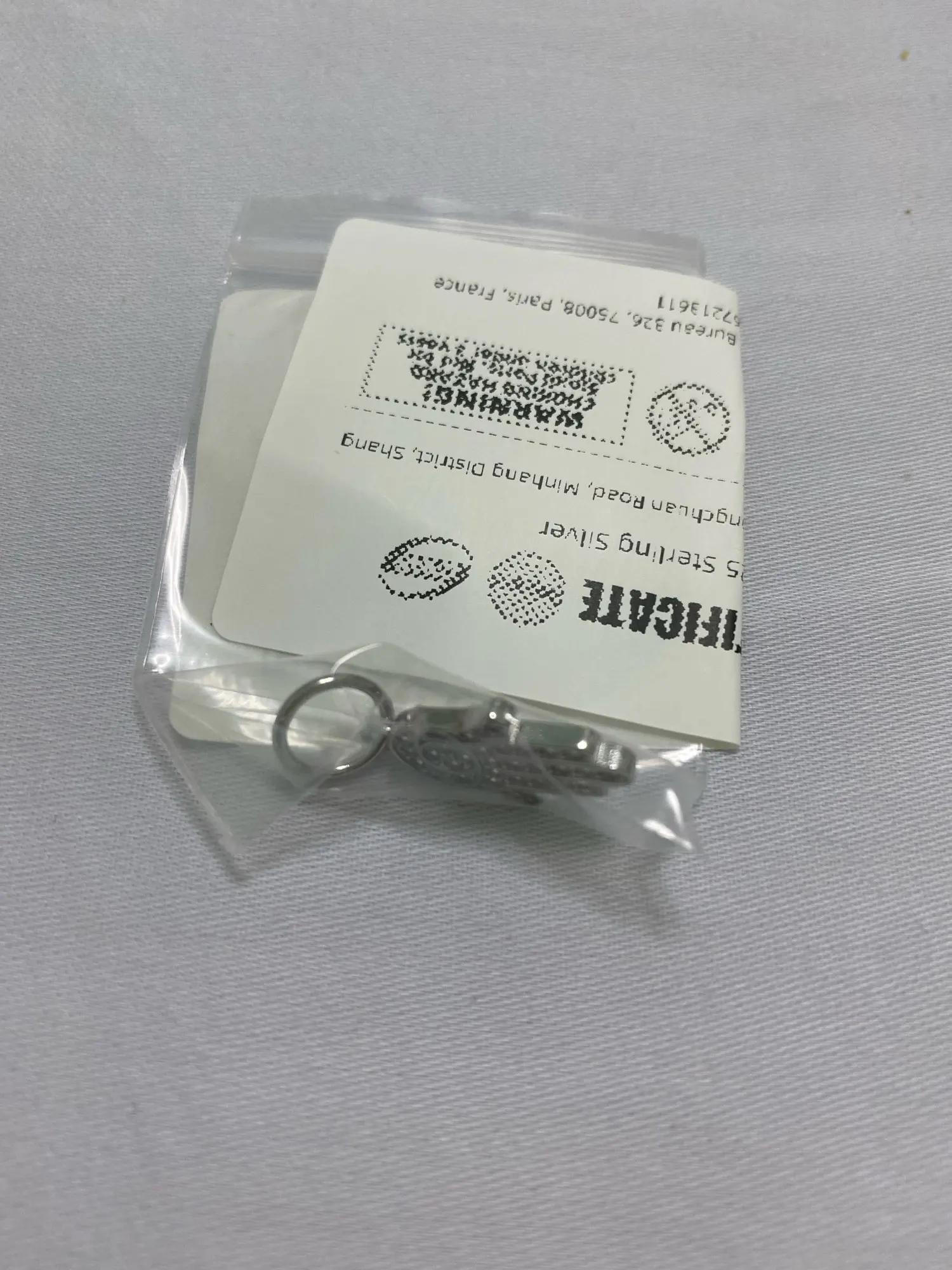 925 Silver Hand Pendant with Zircon Detail photo review