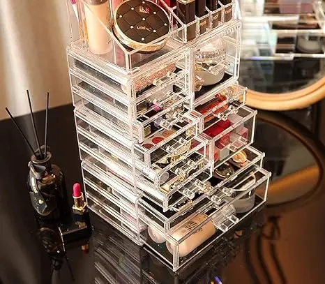 Set of 4 clear stackable organizers. 11 drawers total for cosmetics or skincare. Vanity-friendly design. 5
