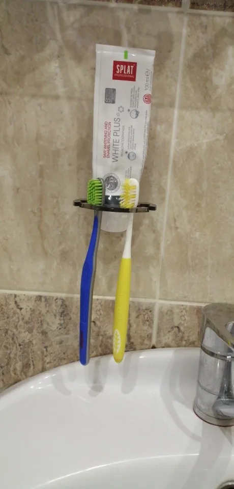 Toothbrush Hanger with Toothpaste Dispenser photo review