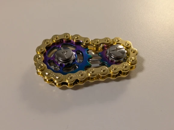 1 colorful metal bicycle chain-shaped fidget spinner toy, effective in relieving stress photo review