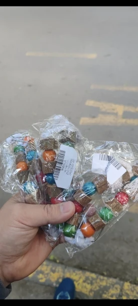 Chirp & Chew Wooden Hanging Toy with Colorful Balls photo review