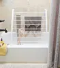 Compact white drying rack, 6"L x 26"W x 51.5"H. Freestanding and foldable for space-saving indoor use. 4