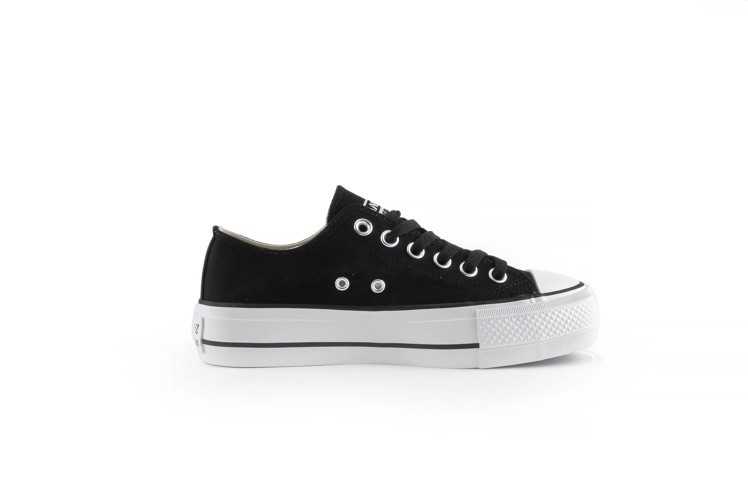 White canvas platform sneakers side view