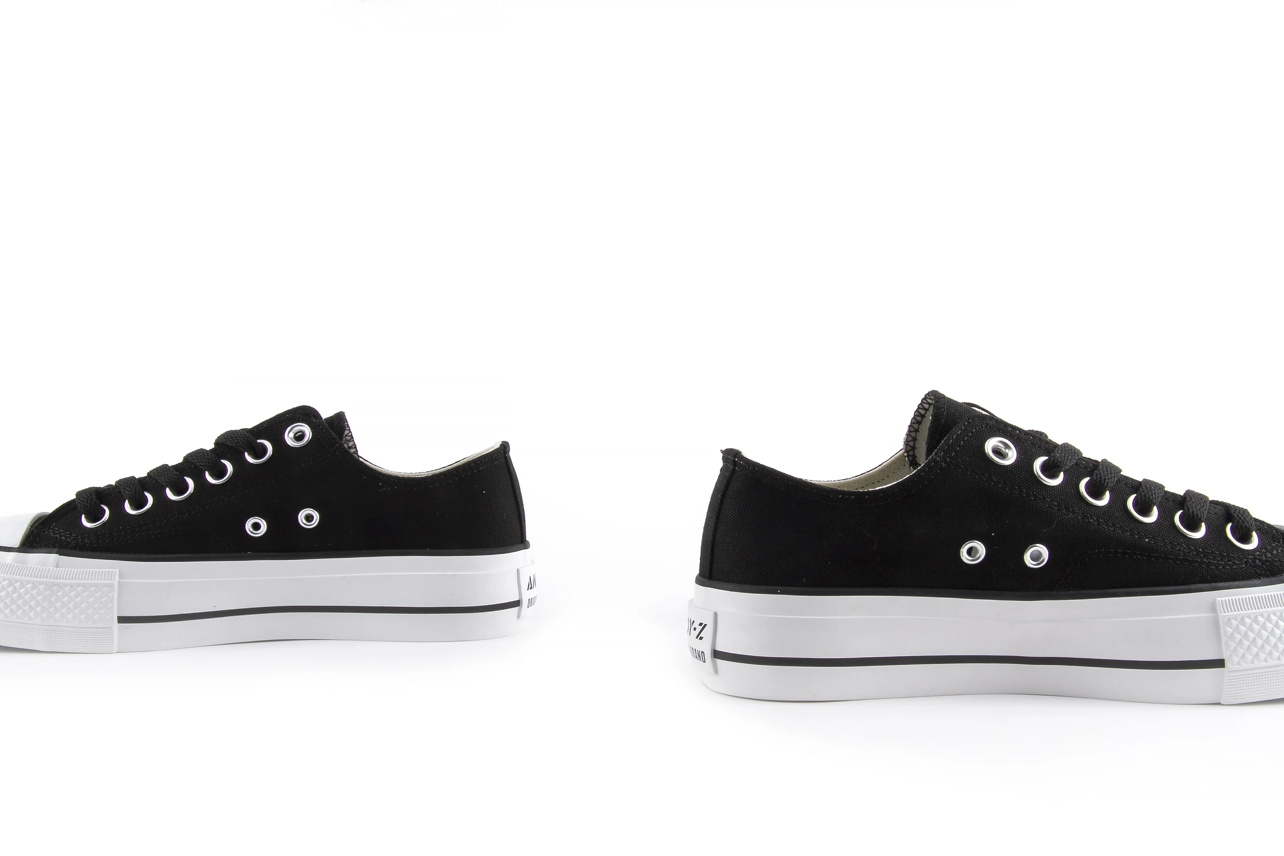 White canvas platform sneakers on foot