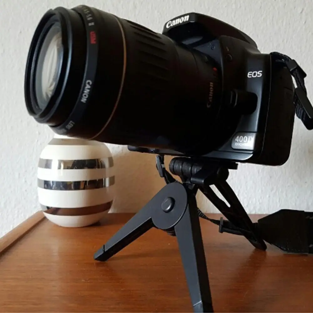 

Portable Mini Folding Tripod Stand with Non-slip Rubber Pad for Digital Camera / Mobile Phone / Camera Weighing Up to 500g