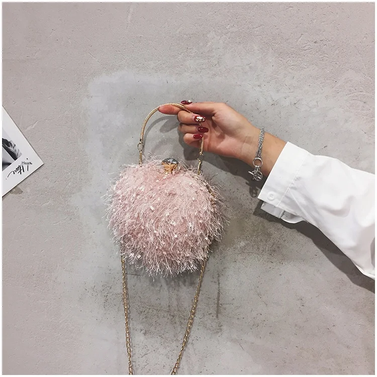 

Mobile phone bag female plush chain small bag female cute ball mobile phone bag 2020 plush cross-body bag to receive zero purse