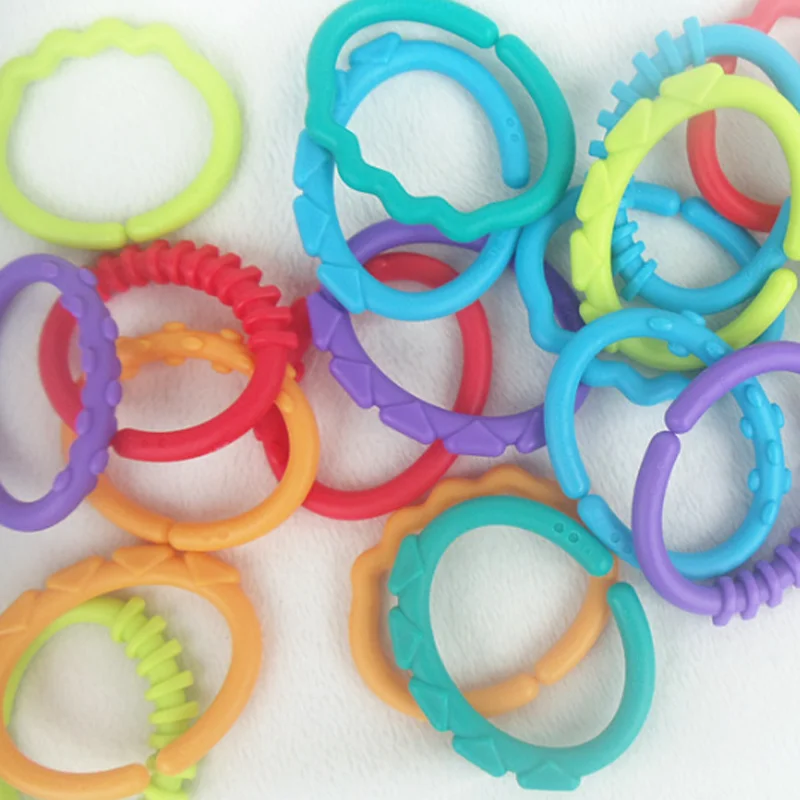 8Pcs/set Plastic Grip Baby Teether Rattles Rubber Rainbow Ring Molars Rattle Safety Toys for Children Crib Bed Stroller Hanging