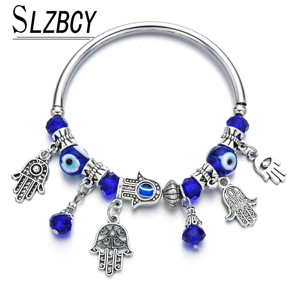 Женский браслет в стиле бохо с подвеской виде глаз и рук украшенный кристаллами