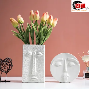 

Nordic ins abstract literary face ceramic vase ornaments Qing bar Huang tea shop table decorations creative furnishings vases