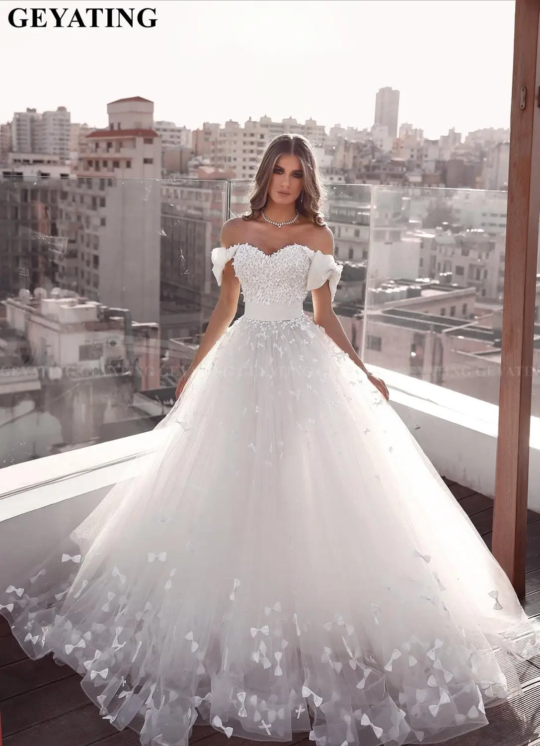 

Elegant Cap Sleeves Ball Gown Arabic Wedding Dress 2020 Off the Shoulder Bow Tulle Islamic Dubai Bridal Gowns Plus Size
