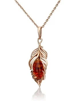 

Yuz platinum pendant feather with amber red gold