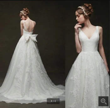 

2020 real picture white lace appliques a line wedding dress sleeveless v neck with bow open back sexy bride dress wedding gowns