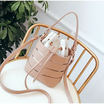 

New Girls Personality Solid Color Hollow PU Small Fairy Bag Women Portable Bucket Bag Female Casual Wild Shoulder Messenger Bag