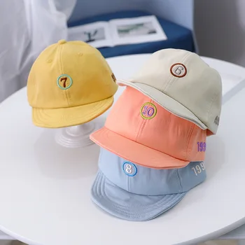 

Baby boy and girl hats Korean baby hat 2020 spring and summer new digital solid color outdoor travel baby sun hat baseball caps