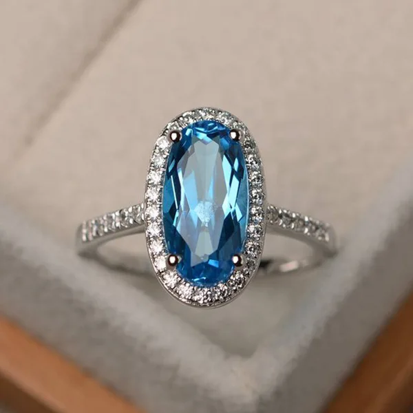 

Exquisite Silver Color Wedding Band Oval Cut Blue Zircon Cocktail Party Women's Ring Bridal Jewelry Fashion Crystal Ring Gifts