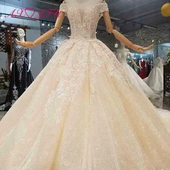 

AXJFU luxury princess beading crystal white flower lace wedding dress vintage handmade boat neck illusion wedding dress 002