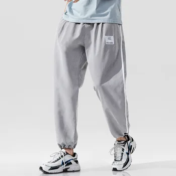 

Japanese Streetwear Spring Casual Pants Men Side Striped Drawstring Trousers Men Leisure Loose Joggers Plus Size M-5XL Men Pants