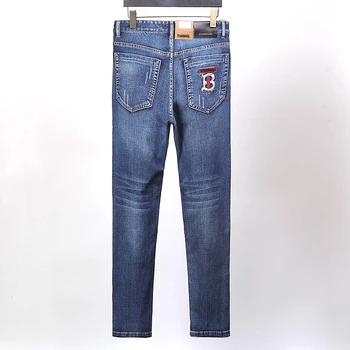 

Star bags PP Four seasons jeans men's popular skull logo armband Decal embroidered letter slim blue elastic straight leg pants