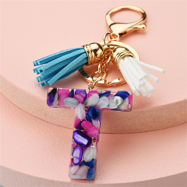 Women Keychains 26 Glitter Hollowed-out Words Handbag Tassel English Letter Keyring with Puffer Ball Charms Free Shipping